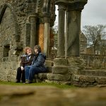 A couple enjoy a visit to St Andrews Cathedral